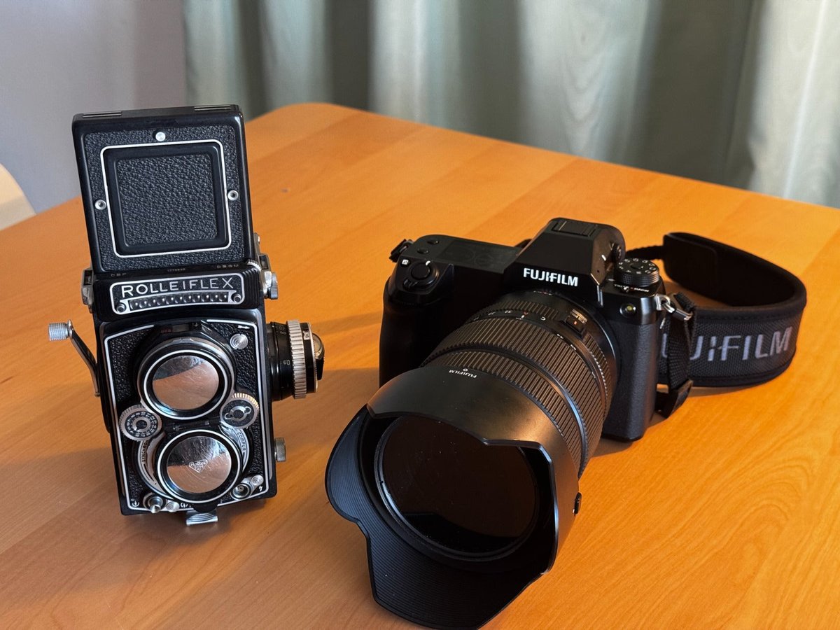 LuPaPhotos's tweet photo. Two ends of the arc. A Rolleiflex twin lens reflex, found in a cabinet on holiday in Portugal, next to my GFX 100S. It's the same kind of camera I started with. https://t.co/64jWV17VtR https://t.co/TDycBFyoOK