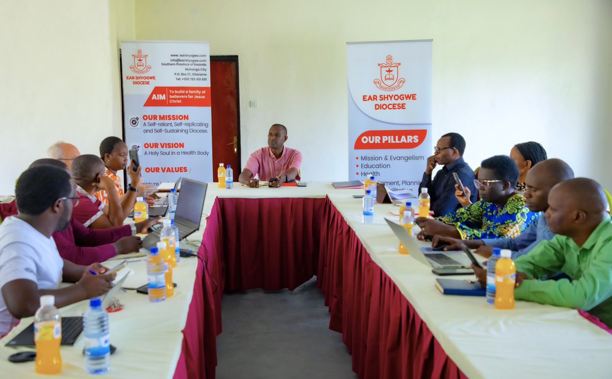 ShyogweDiocese's tweet photo. Rt. Rev. @LouisKabayiza is leading a diocesan staff meeting to review progress and priorities for continued development. 
Senior Expert Hartmut Stinchel is also presenting highlights and the way forward from the three-week chair production training. https://t.co/AsCBzW3cYu