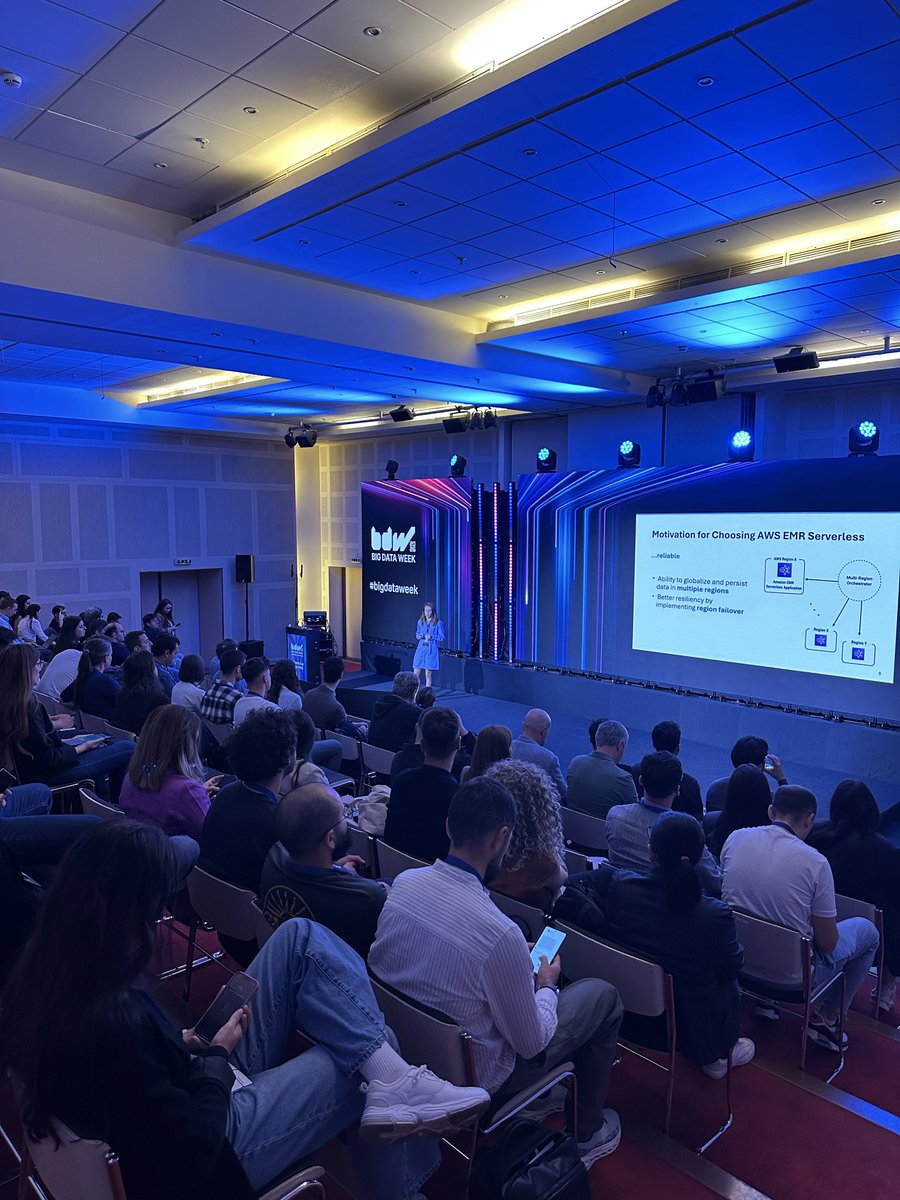 bigdataweek's tweet photo. 🔵 100 million payment events a day, aggregated down to about 200,000 records. Ioana Teoc from @Worldpay_UK is sharing how her team runs that on AWS EMR Serverless. No Spark clusters to manage, and most of the code came from on-premises. #bigdataweek #bdw2026 #bdwbucharest https://t.co/UeTvGYQKHq