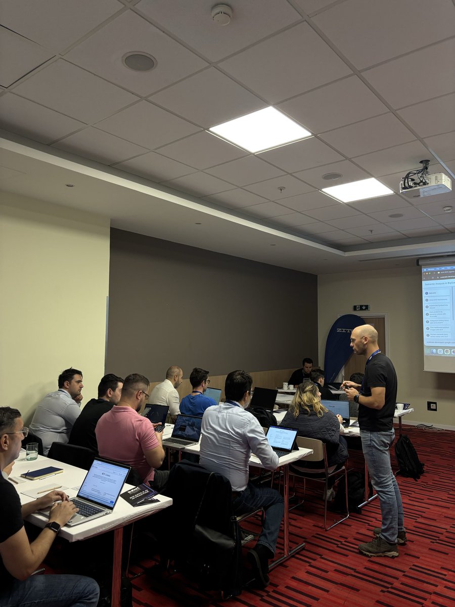bigdataweek's tweet photo. 🟦 BigQuery is doing more than running queries in this room. Dorian Hodorogea and Cosmin Pintoiu from @Google are walking participants through managed AI functions, then deploying an agent to do some of the heavy lifting. 

Powered by @Zitec 

#bigdataweek #bdw2026 #bdwbucharest https://t.co/Nc0g7GprsW