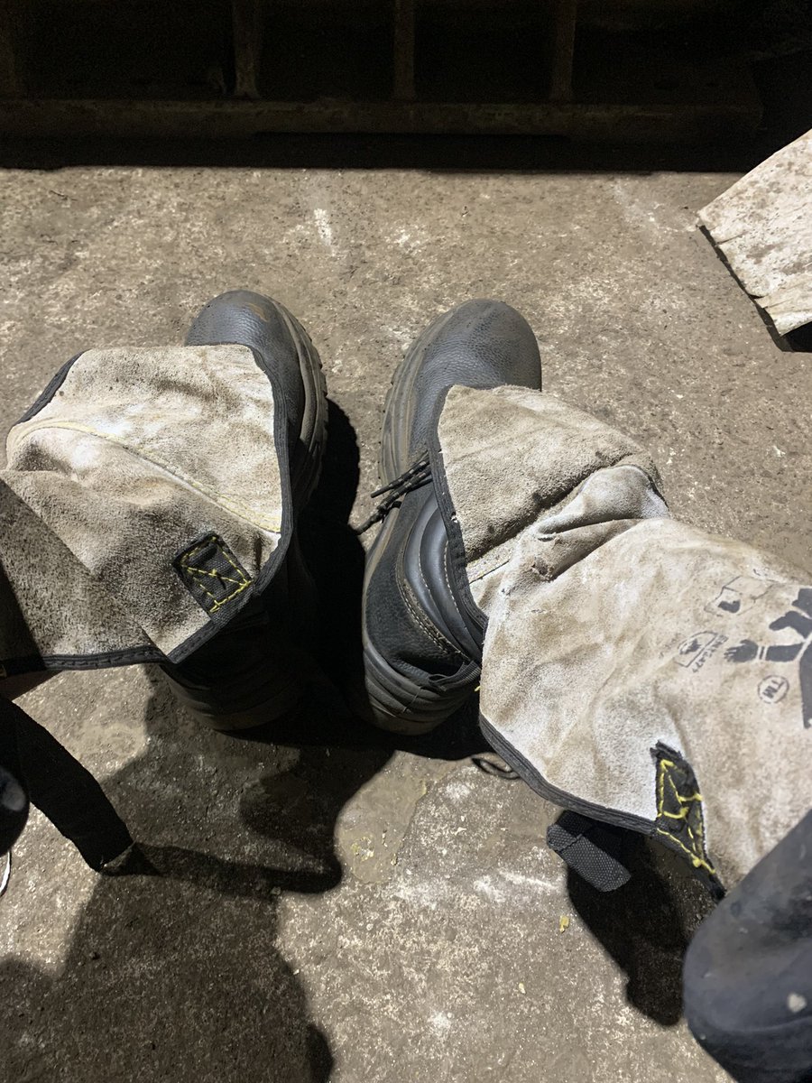 lightout90's tweet photo. Nobody go know say this boot don enter site pass Okada 😂
Leather spats dirty, boot tired, but man still dey stand.
Na so we dey hustle.
 #WeldingLife #WorkshopVibes #BlueCollar https://t.co/OOuYgSaZhD