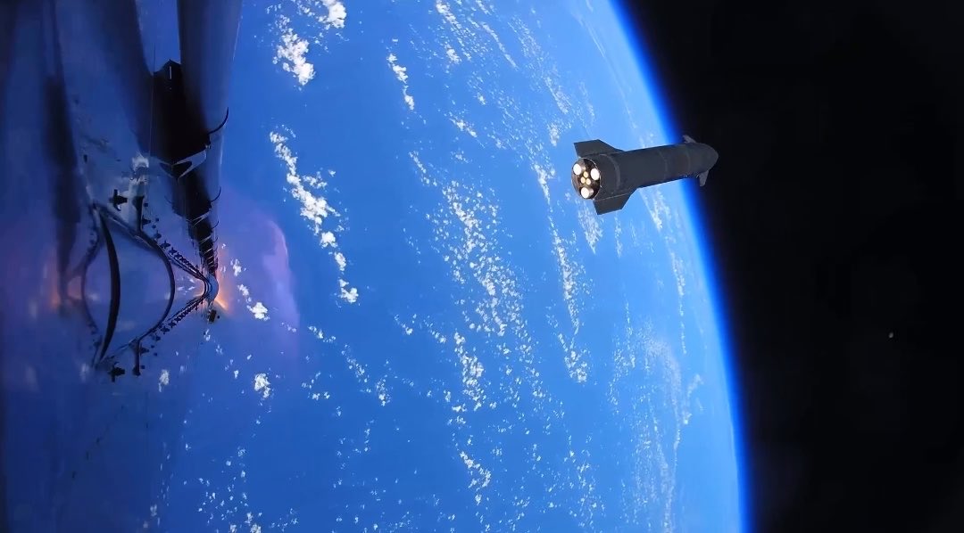 A spacecraft separates from its launch vehicle above Earth's blue horizon, with rocket engines glowing as it begins its ascent into space—a stunning view that captures the awe and ambition of space exploration.