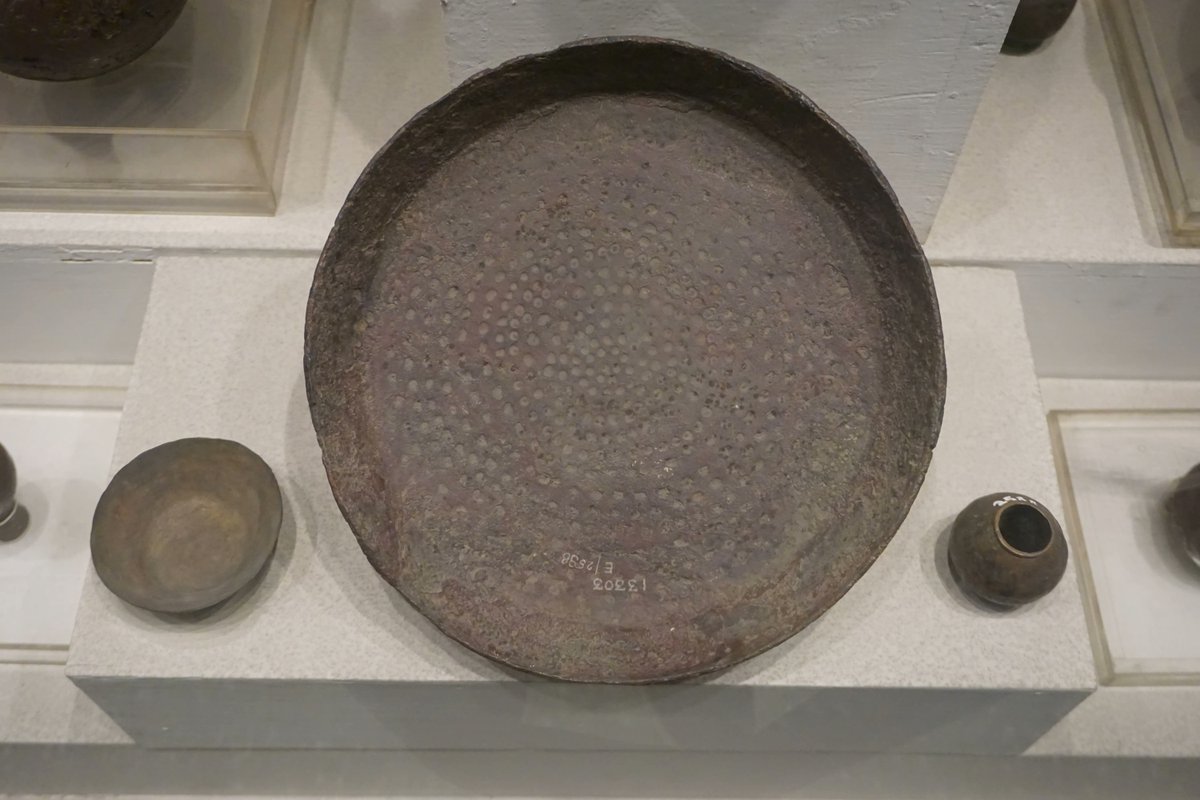 GemsOfINDOLOGY's tweet photo. A dimpled thali, dug out of Harappa. 4,000+ years old.

No credit. No label. No mention.

Today the same design sells for ₹4,500 as a dimpled copper thali. Artisanal. Hand-hammered. Premium. Where's the word Harappa?

In 1960 the same dimpled brass thali cost ₹50 and was called backwards. Primitive. Uneven. Same dents. Same thermal physics. We were taught to be ashamed first, then to pay 90x more.

Factory steel arrived. Flat. Uniform. Cheap. Modern. The thatheras lost their work, the craft ecosystem collapsed, and we called machine-pressed dishes progress.

Then a metro design studio discovered thermal efficiency. 🔥

Dimpling increases surface area, spreads heat better, and gives a firmer grip. Harappans figured that out millennia ago. Now it's on Instagram, part of a ₹850+ crore premium kitchenware market, sold as a brand's original idea.

We didn't just abandon the craft. We abandoned the knowledge of where it came from, then bought it back with a barcode and a story about tradition.

The metal didn't change. The physics didn't change. The credit did.

Your great-grandfather wasn't using primitive dishes. He was using Harappan design we were taught to be embarrassed by.

Who profits when the origin goes unnamed and the product gets a price tag? 💰