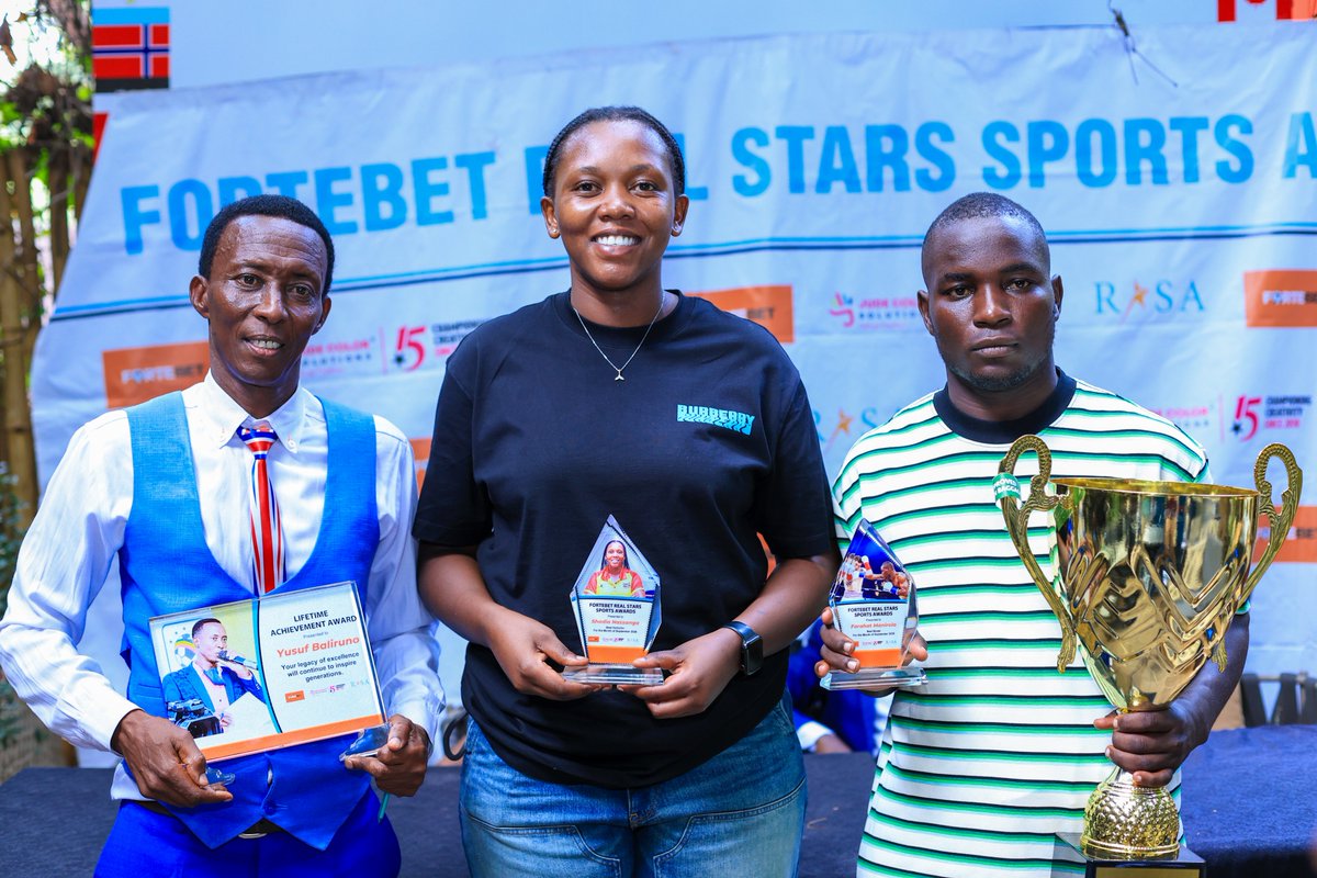 AwardsReal's tweet photo. Our September winners have been crowned today at Molecule in Kololo! 🥇🏆
🏐 Shadia Nassanga — Netball
⛳ Ronald Rugumayo — Golf
🥊 Farahat Manirola — Boxing
👏 The Lifetime Achievement Award went to Uganda’s legendary Yusuf Baliruno.
@fortebet_uganda | @jude_color
#RealAwards https://t.co/tRGNymCmGy