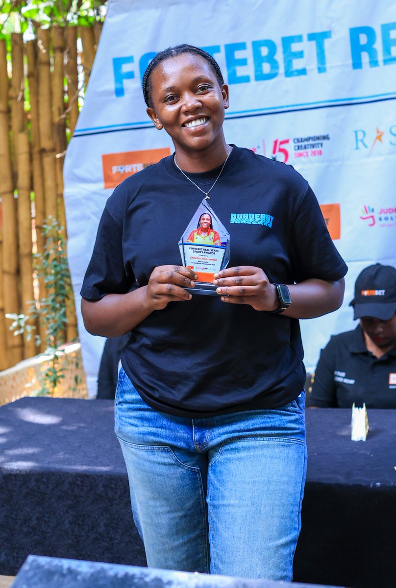 AwardsReal's tweet photo. Our September winners have been crowned today at Molecule in Kololo! 🥇🏆
🏐 Shadia Nassanga — Netball
⛳ Ronald Rugumayo — Golf
🥊 Farahat Manirola — Boxing
👏 The Lifetime Achievement Award went to Uganda’s legendary Yusuf Baliruno.
@fortebet_uganda | @jude_color
#RealAwards https://t.co/tRGNymCmGy