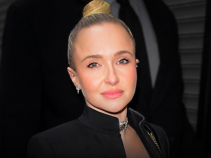 Hayden Panettiere, shown here with her hair in a sleek topknot and wearing a black high-collar blazer with a statement necklace, is at the center of a TMZ exclusive reporting that Wladimir Klitschko alleges some of her jewelry was pawned and is demanding an investigation.