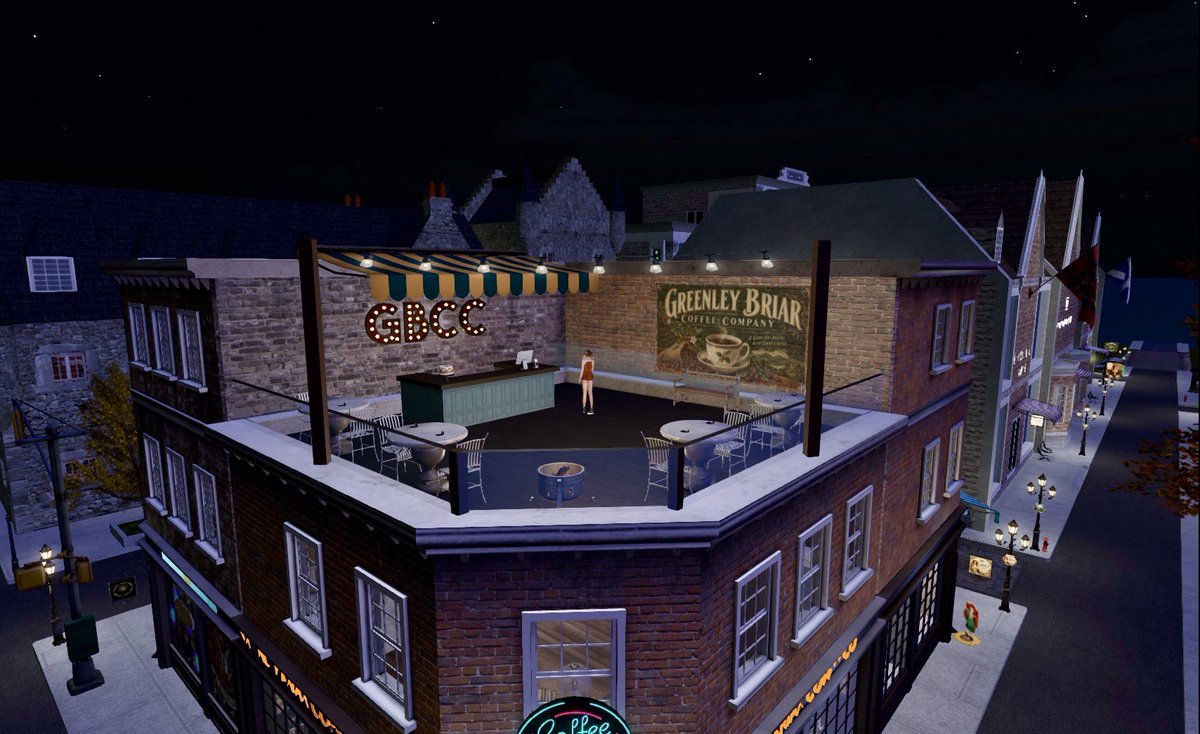 GreenleyBriar's tweet photo. I’m excited about this new roof space above my coffee shop in Dornoch. It really opens up the outdoor possibilities and has great views of the town around it. We still have work to do before we open it but it’s coming along nicely! #SecondLife #GreenleyBriar #Coffee https://t.co/fu0eXADb7z
