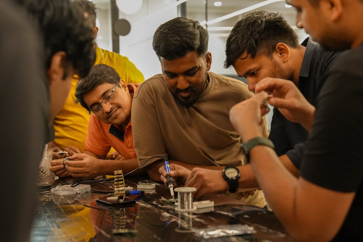 Ayussheth's tweet photo. last sunday, 20 of us built pocket, neo-sapians like wearable in 4 hours.

- learnt power, compute, sensors 
- then how it all fits in a pcb
- soldered all of it together
- flashed the firmware
- used AI to build on top of it

learnt so much about how consumer hardware goes from idea to prototype to manufacturing to a product on shelf.

massive thanks to @buildwithsrini (founder @PcbCupid) as well as @_dc_dhanraj (head of hardware @AinaInterface)

before you ask-
yes, we're doing one again. we know how many of you'll wanted to attend last time but we were sold out

link to register below 👇