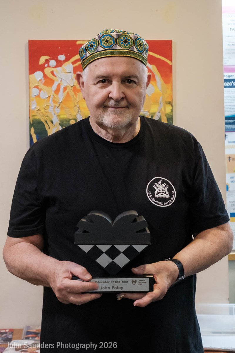 johnchess's tweet photo. Congratulations to John Foley @ChessScholar , president of @KingstonChess, who has been named Chess Educator of the Year for 2026 by the World Chess Federation. A second memento from Samarkand was the stylish Uzbek hat. @FIDE_chess https://t.co/UQ7LLiHYeW