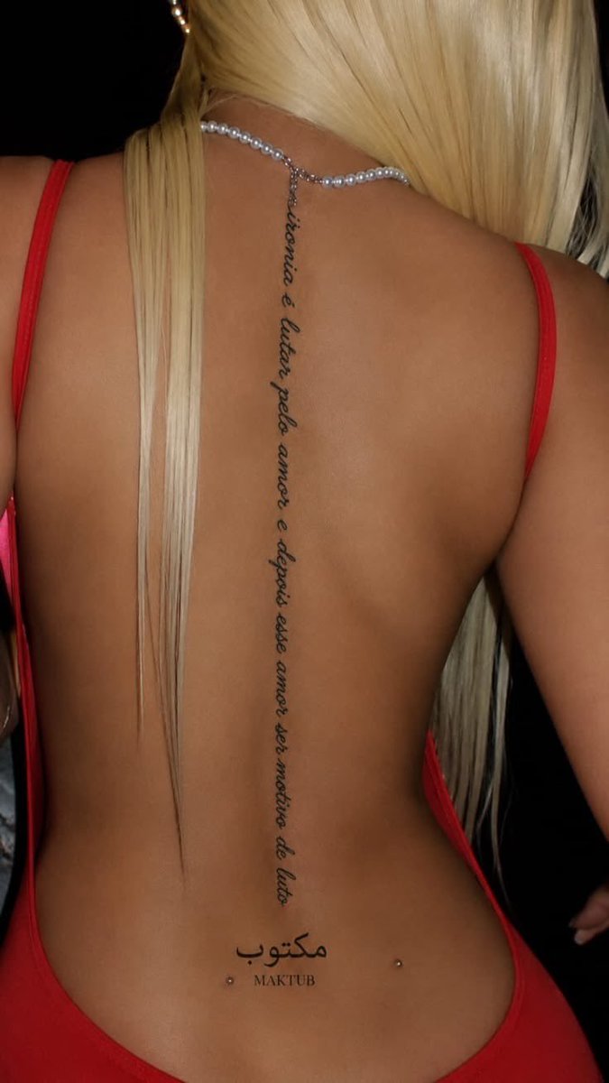 Datsme147's tweet photo. Long blonde hair, thin straps, and a script tattoo down the back is a dangerous combination🥰❤️ https://t.co/T9AwGJGGpv