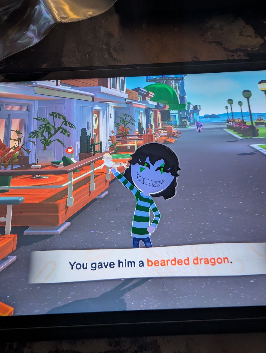 candiedShadow's tweet photo. The official Harlequin comic had me hurting. So I gave him a bearded dragon in TomoDachi life to make myself feel a little better. He loved it.
#tfcharleyquin #thefreakcircus #tfc https://t.co/RpzNjUYakp