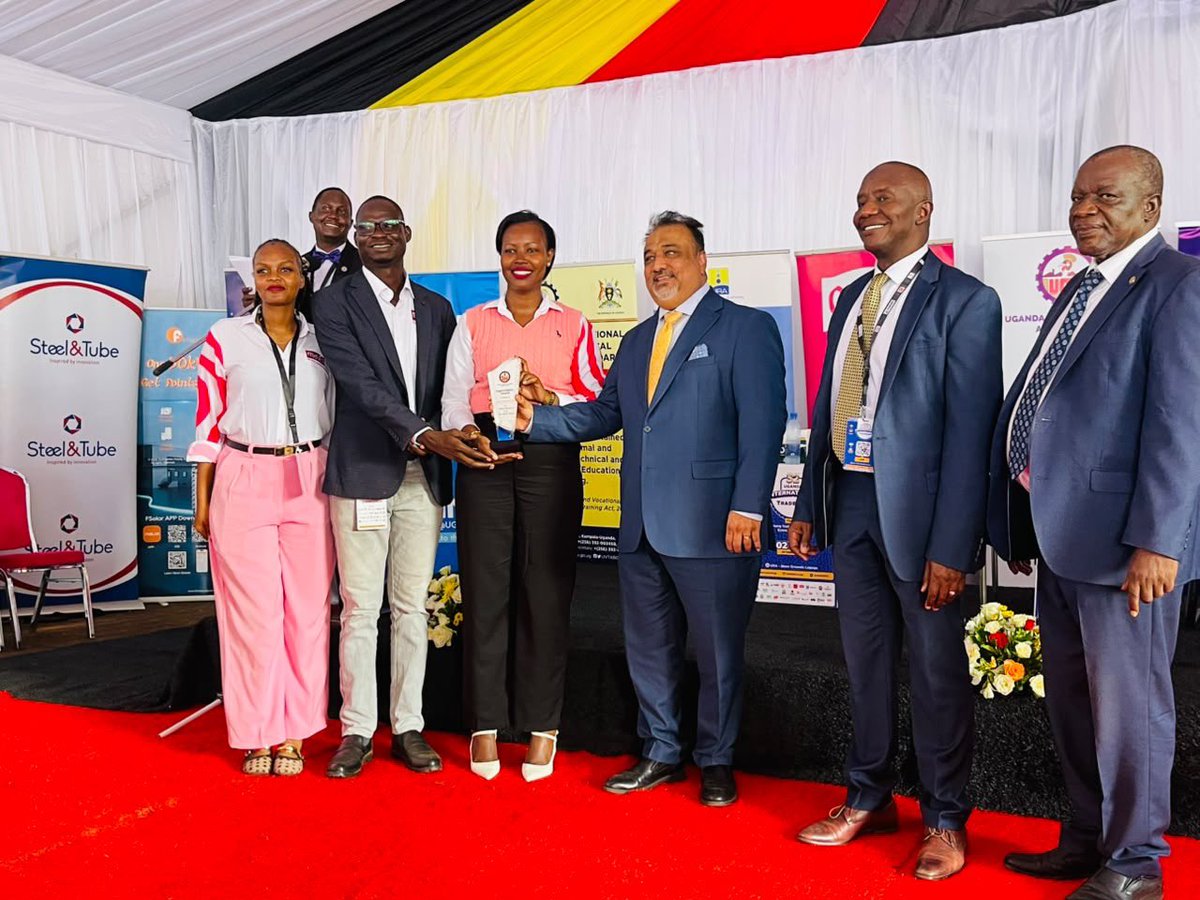 AbubakariSande's tweet photo. Minister Sanjay Tanna Represents President Museveni at 32nd Uganda International Trade Fair.

Minister of Trade, Industry and Cooperatives, Hon. Sanjay Tanna, represented President Yoweri Kaguta Museveni at the 32nd Uganda International Trade Fair at UMA Show Grounds, Lugogo.
During a tour of exhibition stalls led by UMA Executive Director Dr. Ezra Muhumuza Rubanda, Minister Tanna engaged manufacturers and traders on local sourcing of raw materials and the importance of strengthening domestic value chains under the Buy Uganda, Build Uganda (BUBU) agenda.

Delivering the President’s address, Tanna highlighted the need for Uganda to move from exporting raw materials to producing high-value goods through agro-processing, manufacturing, pharmaceuticals, steel, fertilisers and other industries.
President Museveni called for greater investment in innovation, knowledge and value addition, describing the trade fair as a demonstration of Uganda’s ambition to become a production hub rather than a market for imported goods.