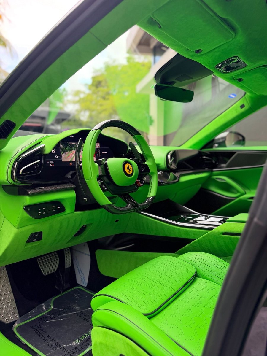 TheAutoHub's tweet photo. 1-of-1 Mansory Ferrari Purosangue https://t.co/WZZ76O4gKa
