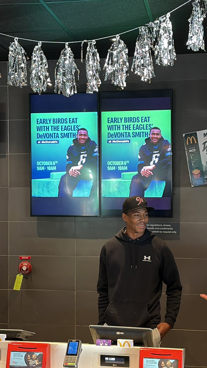 conorfsmith's tweet photo. DeVonta Smith is working the counter at McDonalds in Cherry Hill this morning https://t.co/qDeKxvcTWT