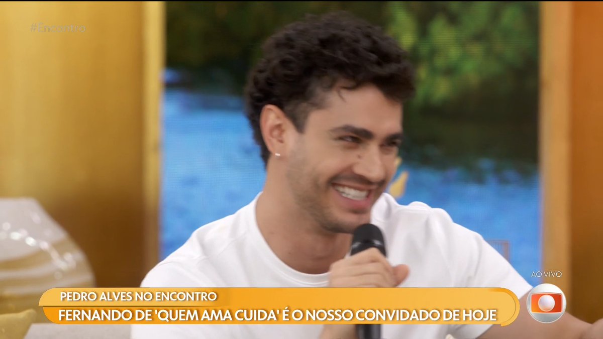 Pedro Alves, identified by the on-screen caption as "Fernando" from "Quem Ama Cuida," appears as a guest on the Brazilian TV program "Encontro," smiling while holding a microphone during the live broadcast. The image relates to the post by showing Pedro Alves sharing his acting journey on the show, as referenced in the caption text on screen.