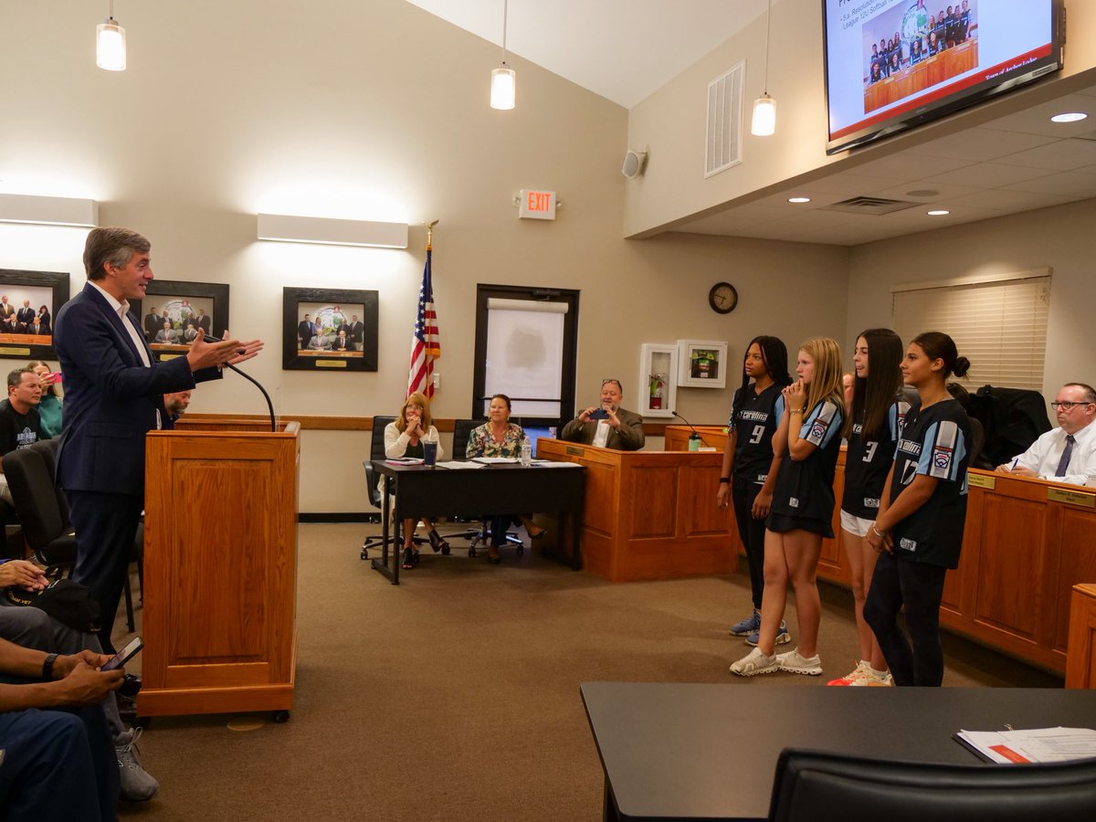 RepKnott's tweet photo. It was my honor to attend the Archer Lodge Town Council Meeting to recognize the Johnston County Little League softball team for their historic World Series victory this past summer. What a team!

I’m also pleased to announce the Archer Lodge Town Council unanimously passed a resolution celebrating these girls and their World Series title! 🇺🇸🇺🇸