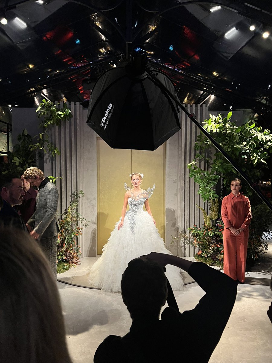 FilmUpdates's tweet photo. Mckenna Grace wears THE REAL Katniss wedding dress from ‘CATCHING FIRE’ in Paris. https://t.co/GRIQdzGXcm