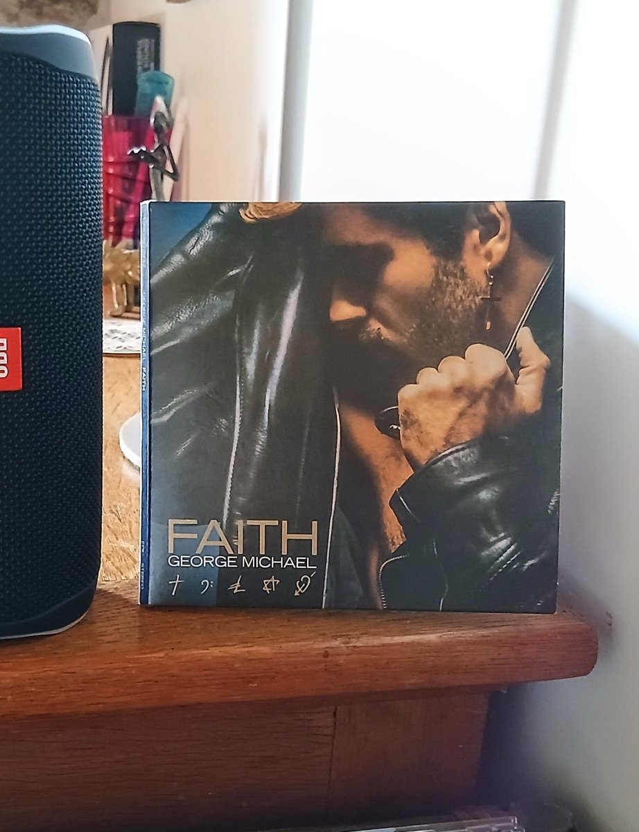 SaraPaccard's tweet photo. This CD is one of my favorite decorations😍  George took such beautiful photos🌟

#georgemichael 
#faith #cd #album 
#faithera

Picture : Sara Paccard https://t.co/hWIhJxGn14