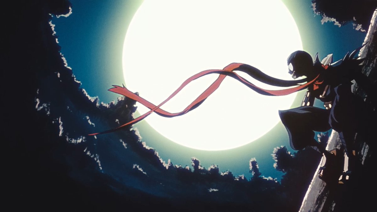 A silhouetted ninja with a flowing red scarf perches against a massive full moon, creating a dramatic nighttime scene. The striking anime-style artwork, titled "Ninja Tom by Jim Punch," captures the mysterious figure in mid-action with crimson ribbons streaming across the luminous moon.