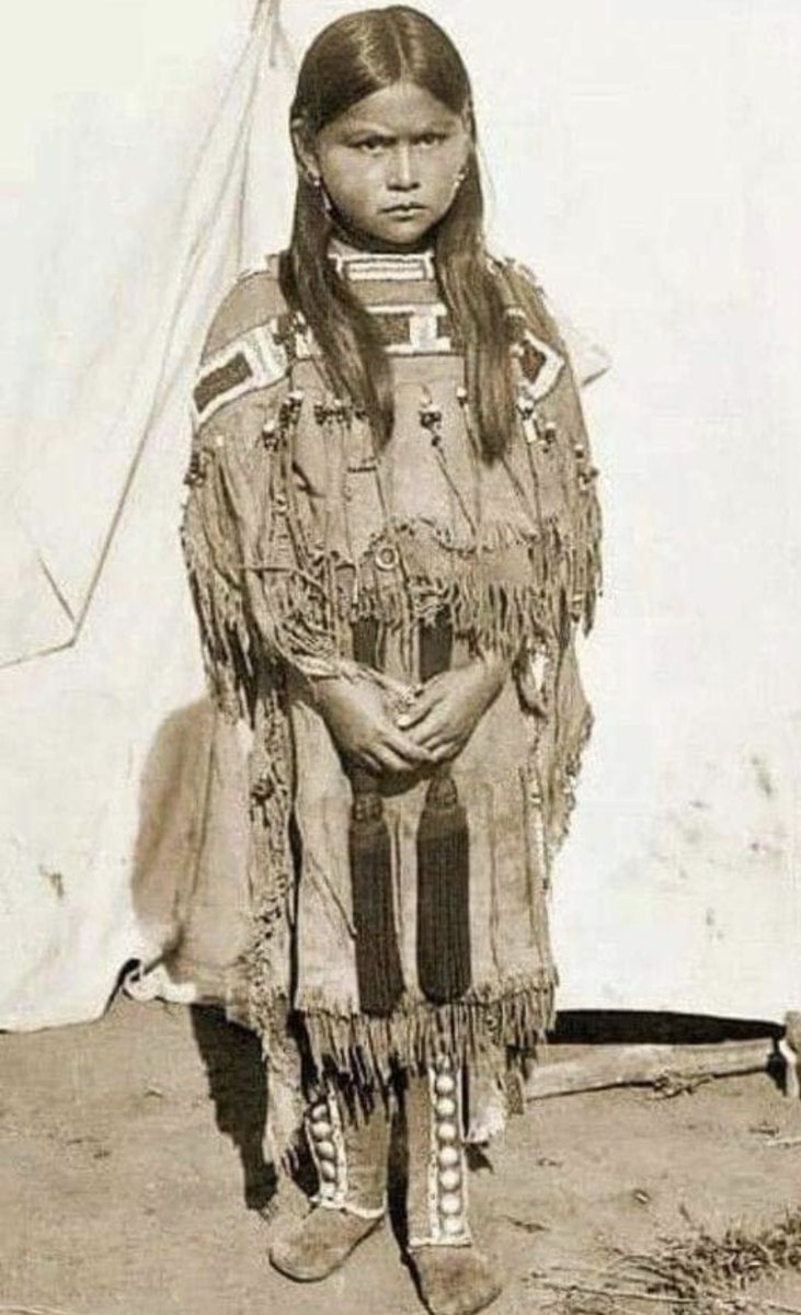 Visionaryvoid's tweet photo. Wanada Parker Page (1882-1970) 

Wanada Parker was born in 1882 in Indian Territory. Her Indian name was Woon-ardy Parker. In Comanche, "Woon-ardy" means "Stand Up and Be Strong" because she was weak in her legs and had to use crutches for a long time. She was also given her mother’s name, Weckeah.

She went to Chilocco Indian School, and in 1894, she was sent to Carlisle Indian School in Pennsylvania. She stayed there for several years with her half-brother Harold (Quanah’s oldest son) and her half-sister Neda.
At Carlisle, her name was first spelled "Juanada," but people said that wasn’t right because she wasn’t Mexican or Spanish. In 1895, she was baptized as "Annie" at St. John’s Episcopal Church in Carlisle, but no one really called her that.

Around 1903, Wanada spent about a year at Fort Sill Indian School, living in the girls’ dormitory.

In 1908, she married Walter Komah, a Comanche man. They moved to Mescalero, New Mexico, but Walter died of tuberculosis in 1912. Wanada came back to Lawton soon after. She worked as assistant matron at Fort Sill Indian School while her sister Alice was a student there.
In 1915, she became a nurse’s aide at Fort Sill Indian Hospital. That’s where she met her future husband, Harrison Page. He was a white soldier in the Medical Corps at the hospital. They traveled by streetcar during their courtship and married on December 18, 1916.
Later in life, Mrs. Page went to the first Parker Family Reunion at Fort Parker, Texas, in 1953. This was when the Indian Parkers of Oklahoma and the white Parkers of Texas met for the first time every year