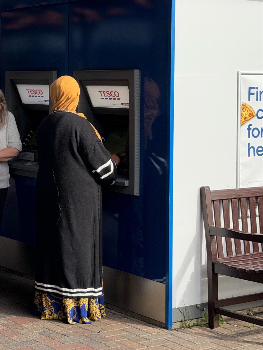 paxangloceltae's tweet photo. I’ve just queued behind this woman at a cash machine. Ended up using the ATM to the left of her. She’s made withdrawals with *six* different cards thus far. Saw three of the transactions and each was for the same amount - £250.00. Am I wrong to think this seems incredibly dodgy? My spidey senses are tingling.

She also kept watching me while I was using the ATM (so I stared at her and asked ‘are you okay?’ and she stopped) and has subsequently watched every customer next to her. Very strange and suspicious behaviour.