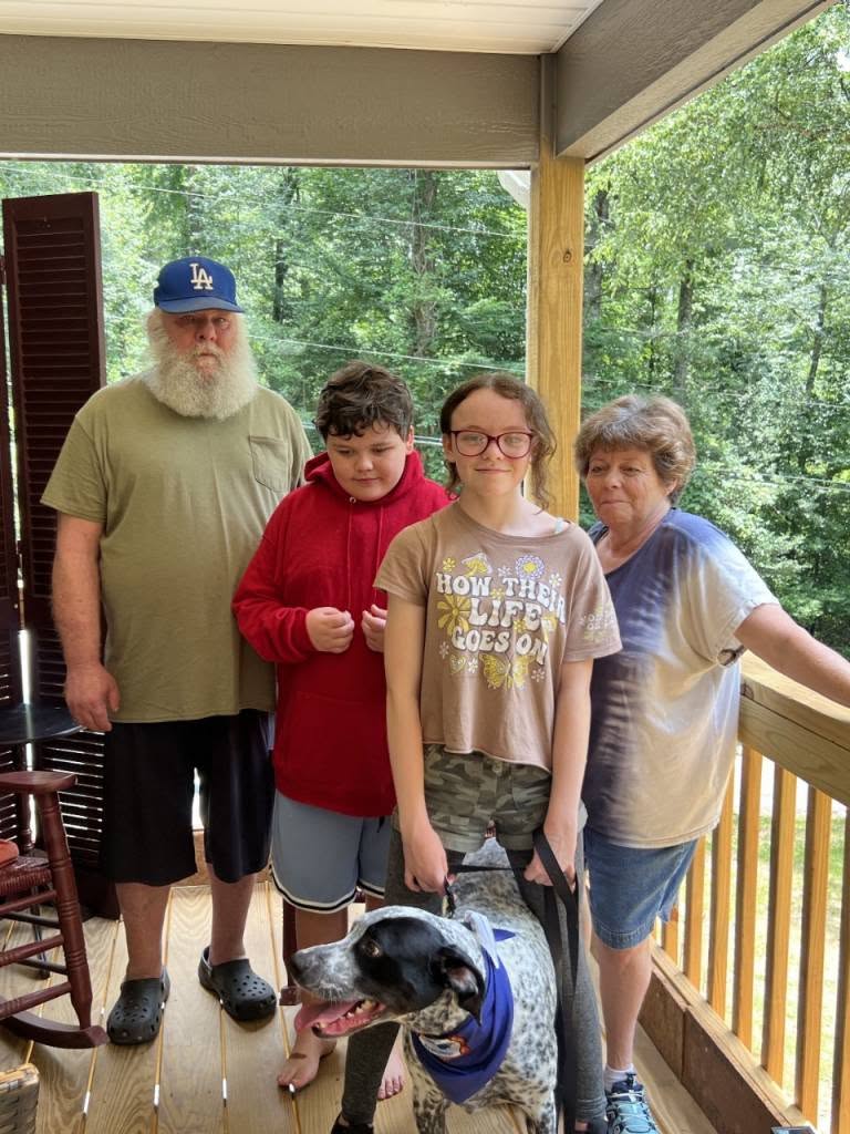 RedCross's tweet photo. Give it up for Tucker! He's a lifesaving hero. 🥹

When a mudslide triggered by Hurricane Helene ripped apart 11-year-old Jamie's home, he was buried beneath nearly 12 feet of rubble.

As rescuers searched, Tucker stood on the debris and barked relentlessly. Eventually, firefighters realized he wasn't just making noise — he was showing them exactly where to find Jamie.

Because Tucker never gave up, Jamie was found alive.

As Jamie recovered, the community showed up to support him and his family. @RedCross_NC volunteers connected with the family and provided them with comfort, resources and financial assistance in the days after the disaster and throughout their recovery journey.

Jamie and his family are now rebuilding their lives after losing nearly everything. Recently, they celebrated a significant milestone: moving into a new home.

And one of the first things Jamie added to his new room was a dog bed for Tucker — the dog who never left his side when he needed him most. ❤️