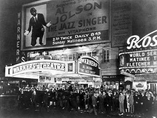 TheRewindDaily's tweet photo. The man who gave movies a voice died the day before anyone heard it. 🎙️

99 years ago today, Oct 6, 1927, The Jazz Singer premiered in New
 York.

Sam Warner had begged his brothers to bet Warner Bros. on sound. He died on October 5. His brothers missed the premiere to bury him.

Here's the twist most people never hear:

→ The film was still mostly silent
→ Only a couple of minutes had spoken dialogue
→ Some of it was Al Jolson ad-libbing

Then Jolson turned to the crowd:

"Wait a minute, wait a minute, you ain't heard nothin' yet!"

The audience erupted. Within a few years, silent film was all but gone.

A complicated film (Jolson performs in blackface), but it changed cinema forever. 🎬

Imagine knowing a story like this for every day of the year.

Follow @TheRewindDaily. You ain't heard nothin' yet.