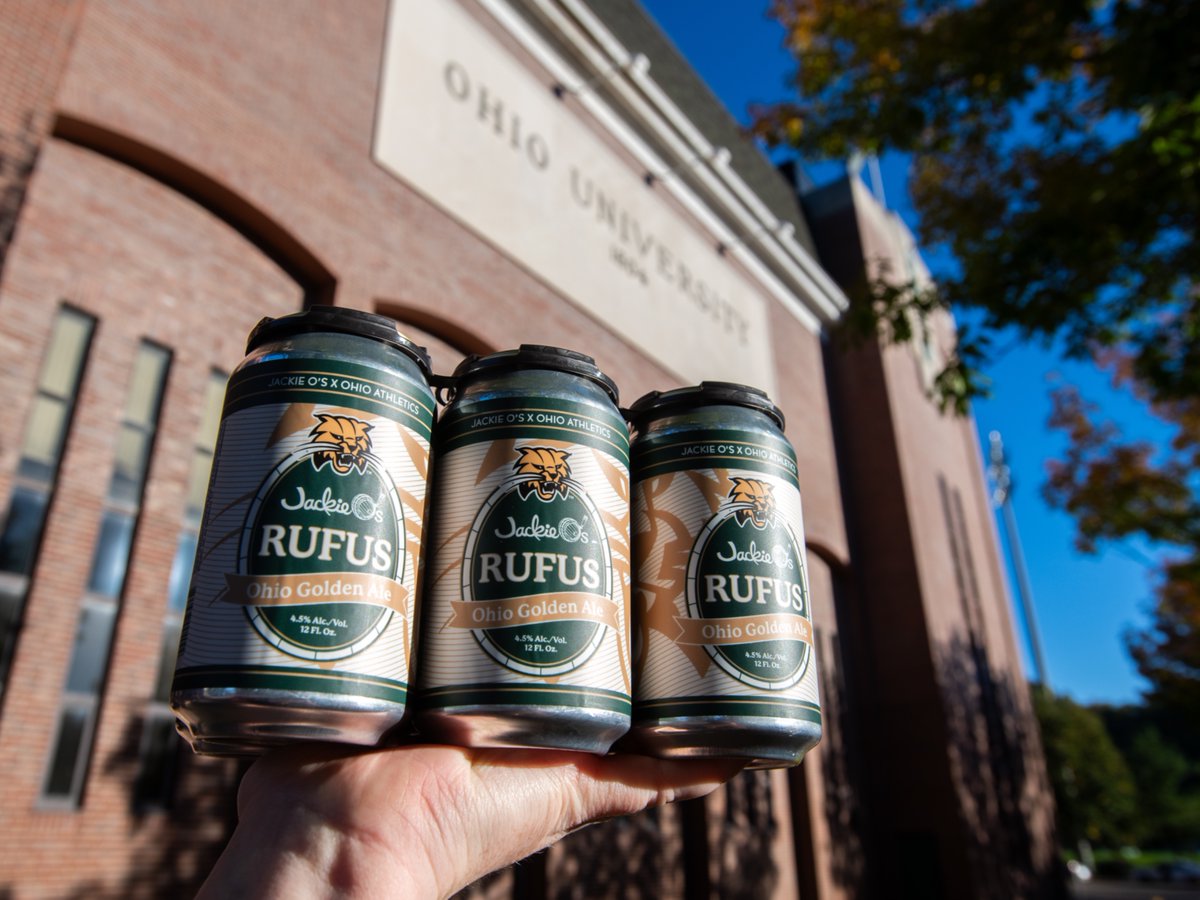 OhioBobcats's tweet photo. 𝙅𝙖𝙘𝙠𝙞𝙚 𝙊’𝙨  🤝  𝙍𝙪𝙛𝙪𝙨

Ohio Athletics and Jackie O’s Brewery introduce Rufus, the first officially licensed Bobcat-branded craft beer.

Rufus will be available in Jackie O's locations and in Peden Stadium throughout October while supplies last. Statewide distribution with Cavalier Distributing begins November 2.  

🔗 https://t.co/NmRC5w3XXY

#OUohyeah