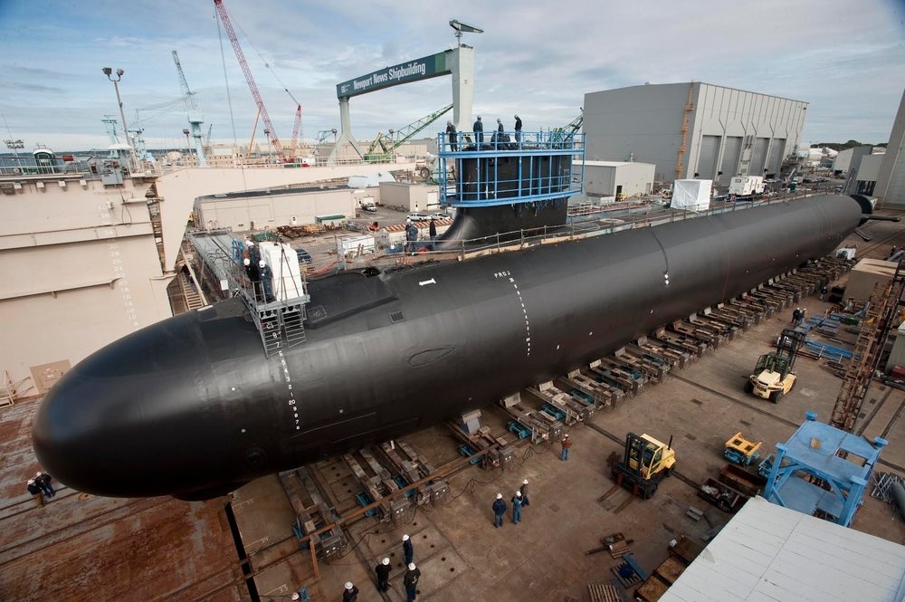 AndurilObserver's tweet photo. Anduril is committing $3.7 billion in private investment to help build the Navy’s nuclear-powered submarines.

The planned Arsenal-2 shipyard at Sparrows Point, Maryland—the former Bethlehem Steel site—will manufacture components and large sections for Virginia-class attack submarines. Initial operations are targeted for 2030, with roughly 3,100 permanent jobs projected.

These are crewed submarines used to hunt enemy ships and submarines, gather intelligence and launch conventional cruise missiles. Anduril will supply parts and assemblies; Electric Boat and Newport News Shipbuilding will continue assembling the finished boats.

The starting point explains the opportunity: torpedo tubes, reportedly among the components delaying submarines already under construction. One missing part can hold up an enormously expensive vessel.

Submarines are built in sections. Making more of those sections elsewhere allows work to happen in parallel and can free space and skilled workers at the final-assembly yards. The Navy already uses outside suppliers this way. Anduril is proposing a substantial addition to that network.

Alongside its private investment, Anduril reports a Navy contract worth up to $2.9 billion, with payments tied to production results. The $6.6 billion headline combines those figures—it does not represent an upfront government payment. The detailed award record and amount currently obligated still need direct verification.

Maryland and Baltimore County also propose incentives, with new appropriations requiring legislative approval, including support for workforce training.

Before Sparrows Point opens, a smaller Orange County facility will develop manufacturing methods, quality controls and the early workforce.

That preparation matters. Submarine parts require qualified processes, trained workers and rigorous inspection. Faster fabrication only helps if the parts pass inspection and arrive when the shipbuilders need them.

For Anduril, this expands its manufacturing business into a major, established Navy program. For defense-tech companies, it demonstrates another route into those programs: supplying industrial capacity the existing builders need.

The first milestones to watch are accepted components delivered on schedule and more assembly work handled outside the overloaded yards. Success means those additions help get submarines to the fleet sooner.