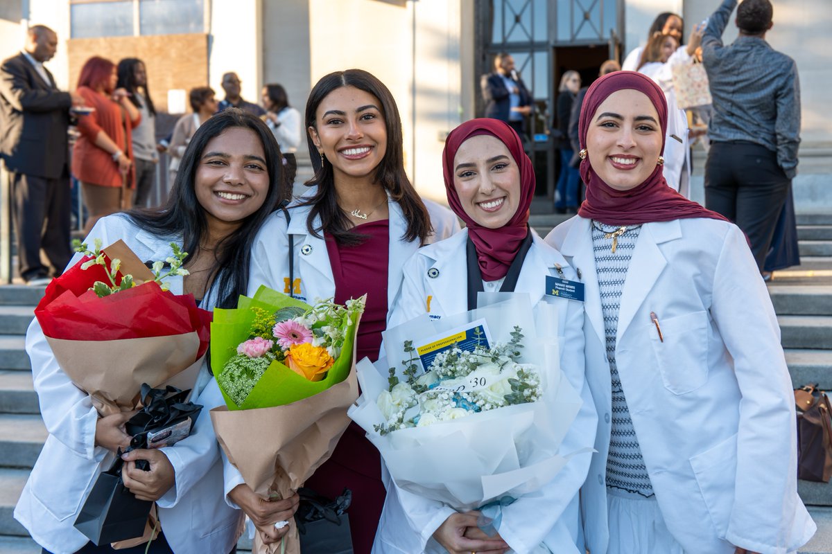 UMichPharmacy's tweet photo. The coats are on. The journey continues. 🥼💙

Congratulations to our first-year PharmD students on receiving their white coats yesterday! This marks an exciting step forward in their journey to becoming pharmacists. https://t.co/BU7XMg0Ioz