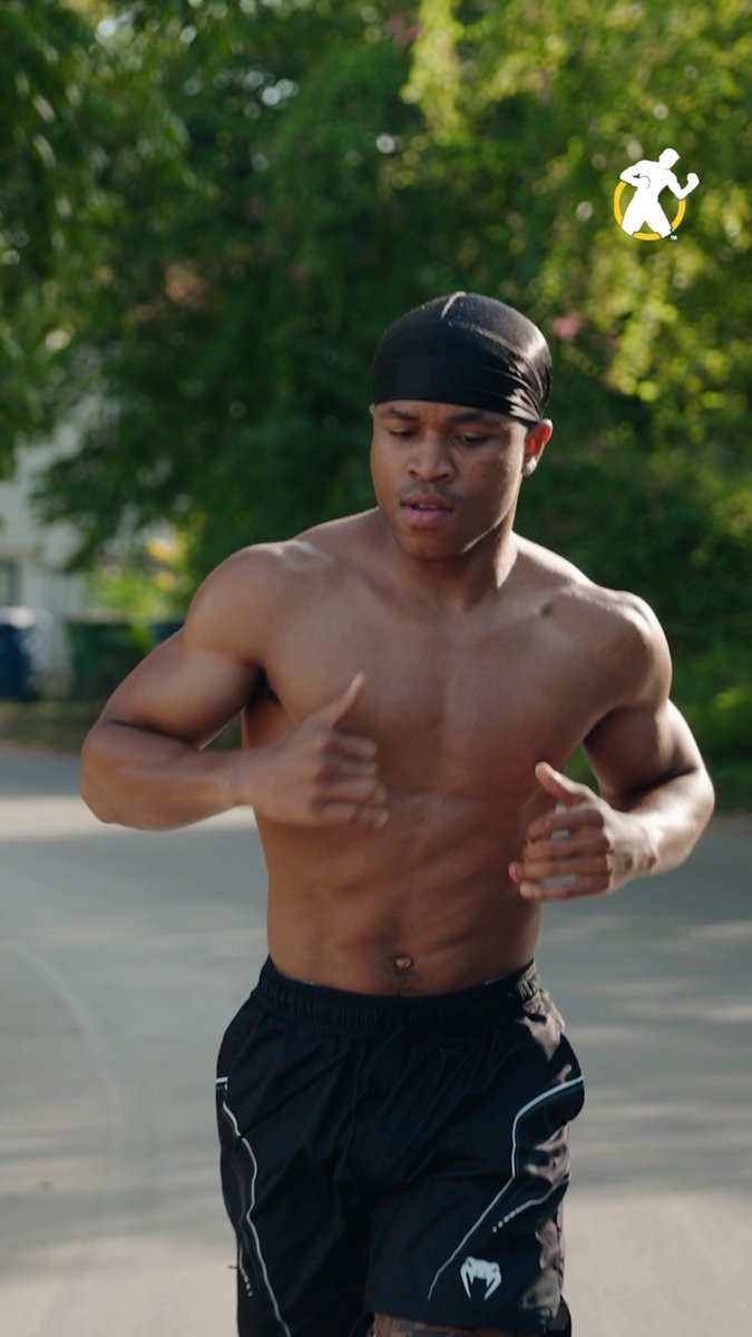 Floyd Schofield is shown shirtless, running outdoors while wearing a black durag and black Venum fight shorts, showcasing his lean, defined physique in preparation for his October 10th title fight. The post promotes his upcoming DAZN bout, highlighting his growth and maturity heading into this world title opportunity.