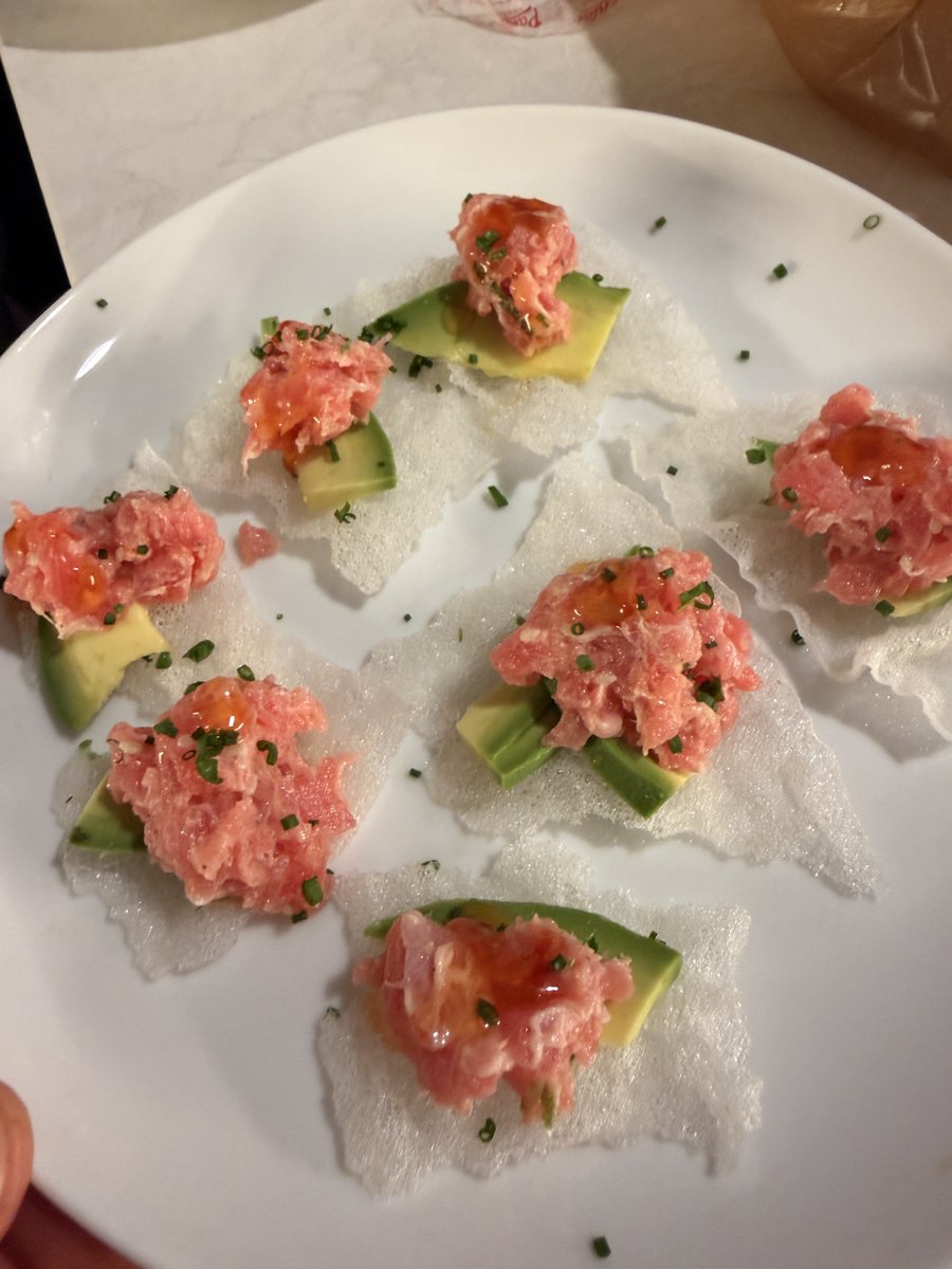 adamtalvarez's tweet photo. Bluefin toro on crackers, red Thai curry snapper https://t.co/7GTzqLIP5Q