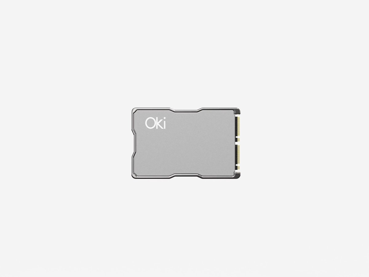 TonyKenBreezy's tweet photo. Holding a small silver Memchip that keeps all your data inside Oki Home is such a cool idea shown in this render. Having a Personal AI Computer with physical storage makes sense. https://t.co/RVA0C8h2oK