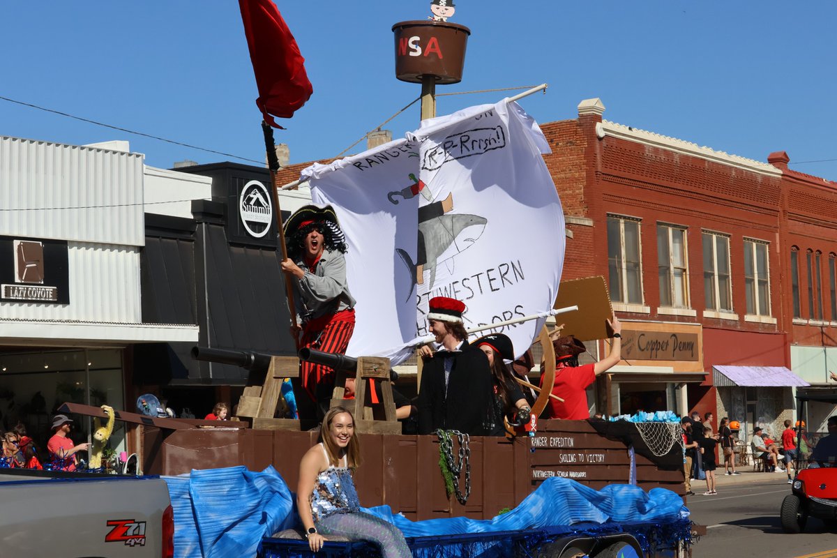 NWOSU's tweet photo. Pirates, strongmen, rock stars: we've seen it all on Downtown Alva Square. 🏴‍☠️ 

Float entries for the Northwestern Oklahoma State University Homecoming Parade close at noon Wednesday, Oct. 7. 

Go "Red, White &amp; Rowdy" and earn $200 just for competing. https://t.co/bY0X2M0c5l