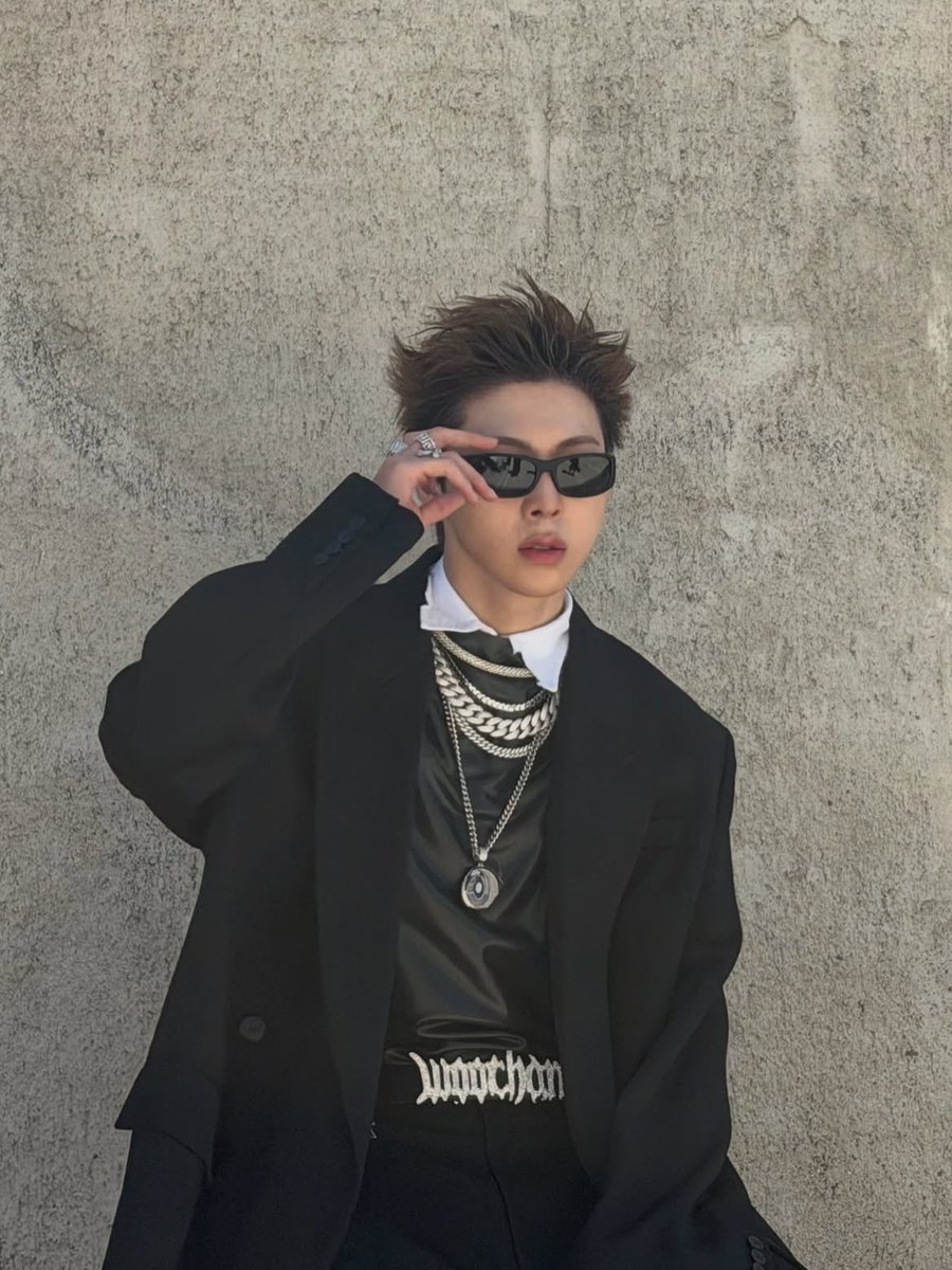 Waoochn's tweet photo. Suit on, chains heavy, and a glance that tells you everything you need to know. Let’s just say we don’t do subtle. https://t.co/Ft377HzcPT