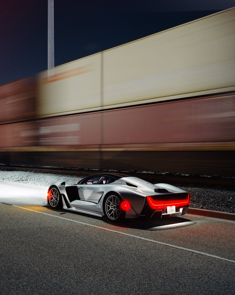 CzingerVehicles's tweet photo. After hours at the Port of LA, the 21C VMax gets ready to charge into the night with 1,250 hp lying beneath its streamlined bodywork. 

#Czinger21C #MadeInAmerica #CaliforniaHypercar https://t.co/tD65VhSTlR