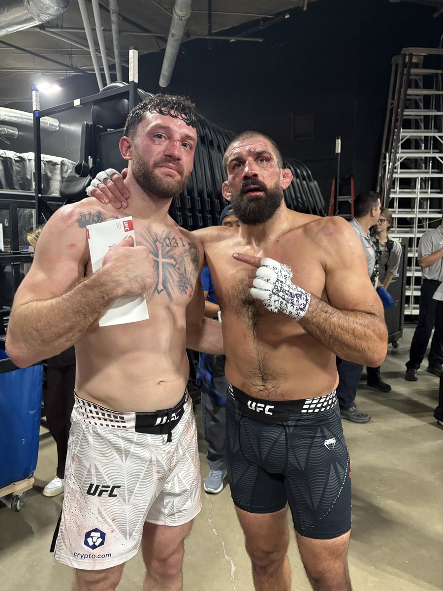 Court_McGee's tweet photo. Couldn’t have shared the octagon with a better man for the last dance of my @ufc career. Eric you are a fierce competitor and honorable in victory… thank you, sir 🙏🏽 https://t.co/2bC0CF9OqU