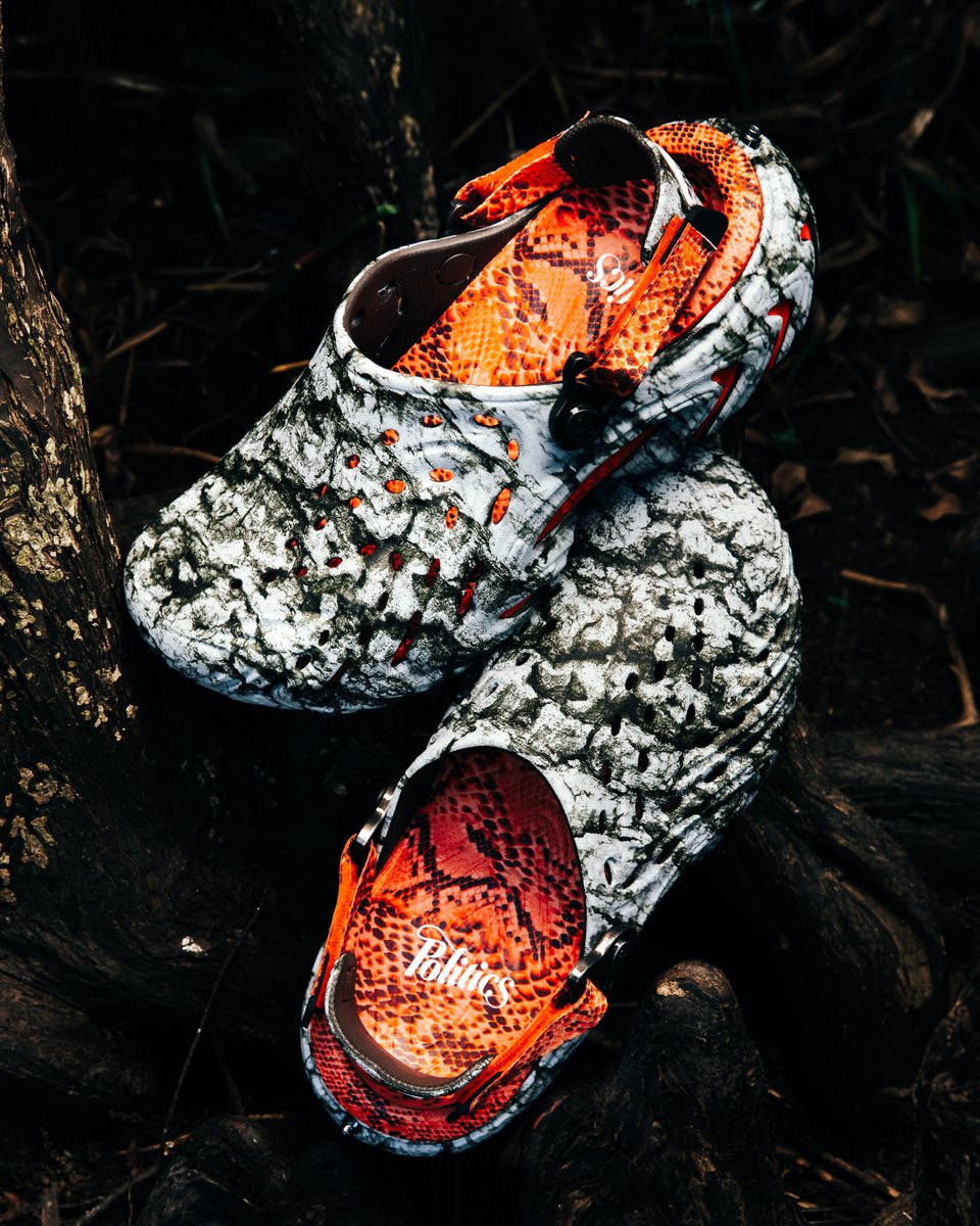 Sneakerpolitics's tweet photo. The Politics x Crocs Echo II ‘Watch Your Step’ disappears into its surroundings with a ghillie-style shroud with layered grass-like strands, and a copperhead-inspired mix of snakeskin and tree bark camo. Hunter orange flashes beneath the cover, while an adjustable backstrap and metallic Politics detailing keep it locked in when it’s time to strike.

The Politics x Crocs Echo II ‘Watch Your Step’ is releasing on 10/10 in-store at all Politics locations. The collaboration releases online at 9 AM CT on 10/11. 

Enter Draw: https://t.co/Vl9sj5SR3K