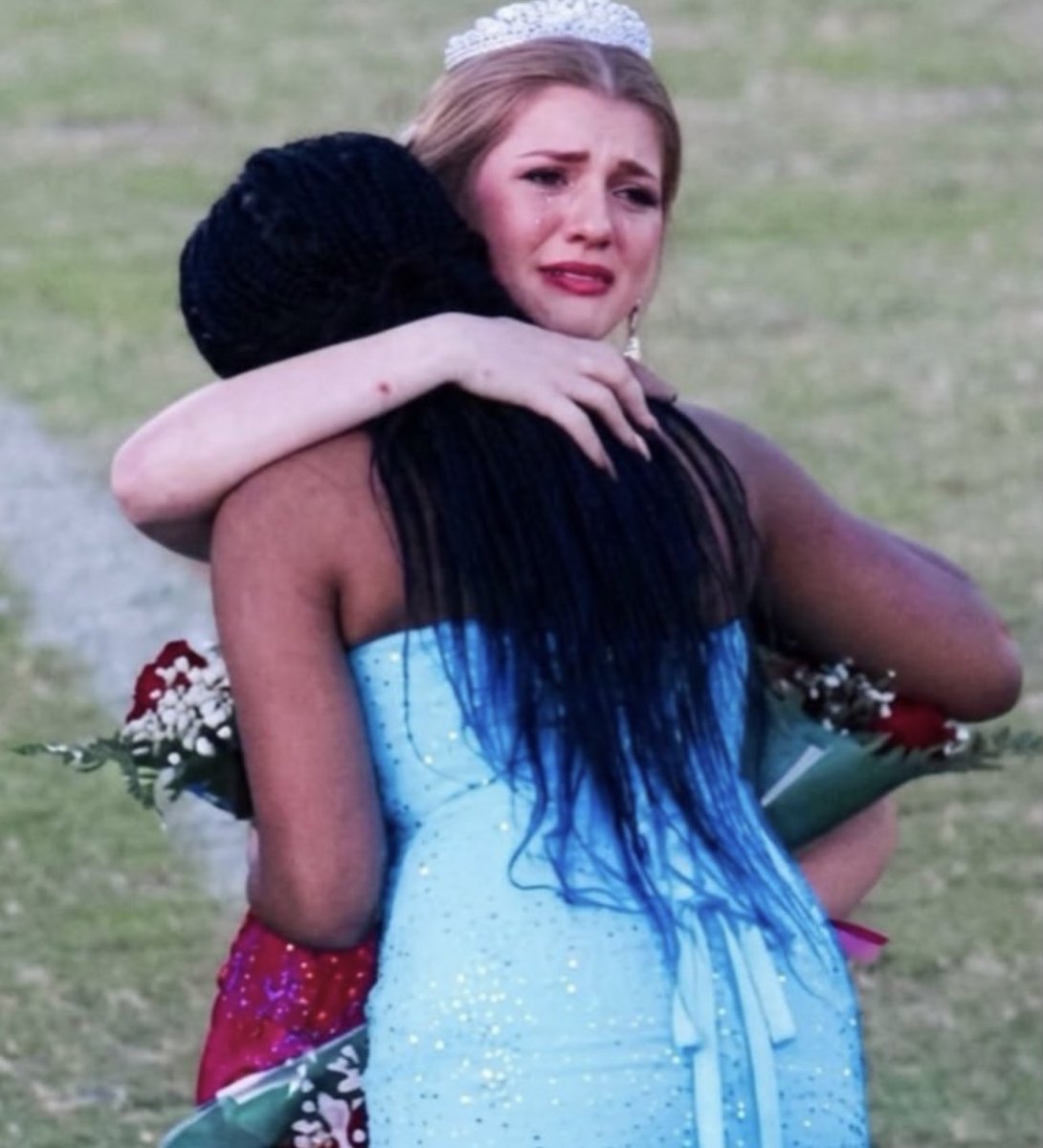 DavidJHarrisJr's tweet photo. 🚨HEART OF GOLD: High school homecoming queen hands over her crown to a grieving classmate who lost her mother to cancer earlier that same morning!

At Forrest County Agricultural High School in Mississippi, senior Nyla Covington achieved what many high school girls dream of when her classmates voted her 2021 Homecoming Queen.

As the crown was placed on her head, Nyla’s heart was with her friend and fellow court nominee, Brittany Walters.
Just hours earlier that morning, Brittany’s mother, A.J., passed away after a brave battle with cancer—having spent her final moments making Brittany promise she would still walk out onto the field that night.

Without a second thought, Nyla turned to Brittany on the field, took off her crown, and placed it directly onto her friend's head, telling her, "You're your mom's queen."

While Brittany initially hesitated, Nyla insisted, embracing her in front of a tearful, cheering stadium of students and parents.
Her selfless gesture turned a moment of personal triumph into an unforgettable display of love, empathy, and true sisterhood!👑❤️🇺🇸