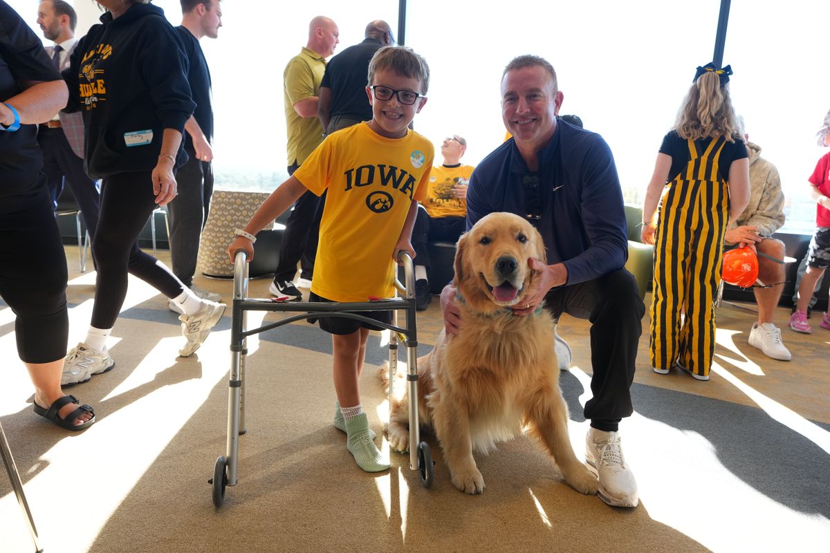 ESPNFrontRow's tweet photo. Beyond the Hawkeye Wave 💛

Before @CollegeGameDay took the stage in Iowa City last weekend, members of the crew visited @UIchildrens

The experience sparked powerful reflections from the team &amp; a $1M donation from @PatMcAfeeShow

More on the visit: https://t.co/wK45gAH1x3 https://t.co/lUiIbEotvj