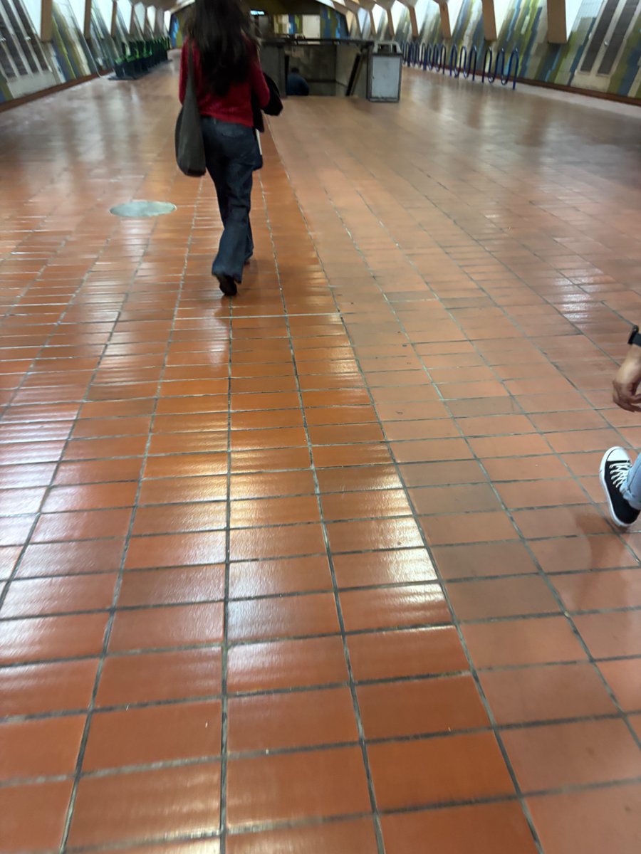 jillianiles's tweet photo. saw the bart floor getting a serious scrub down last week, and this week it is *shining*! very satisfying but also funny that they only did half https://t.co/rRKauFjaMx