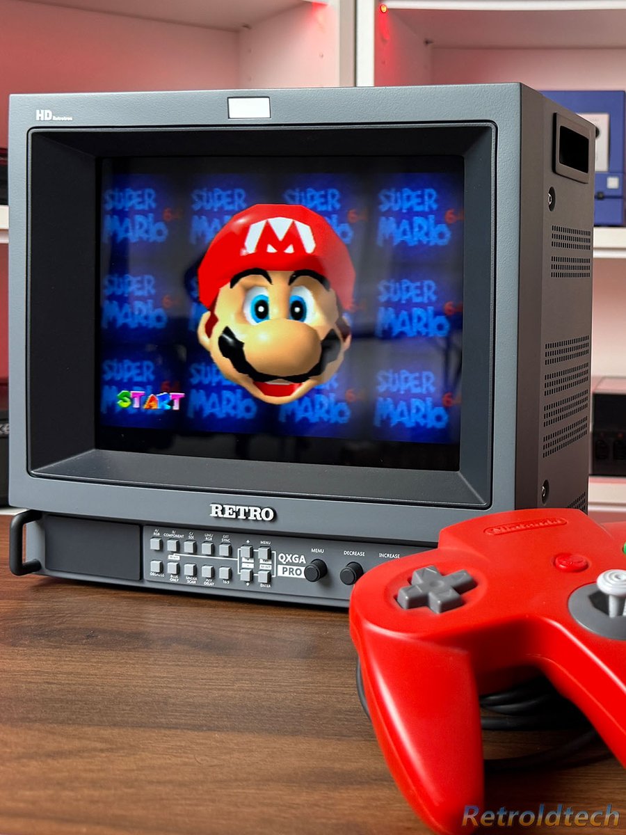 Retroldtech's tweet photo. Slim PVM PRO in Classic Gray. Handcrafted for setups exactly like this.

Mario has already spotted that red N64 controller… and judging by that look, he wants it 😅

Now imagine the PRO at the center of your own retro setup. Which color would you choose? https://t.co/EOmcGN4off