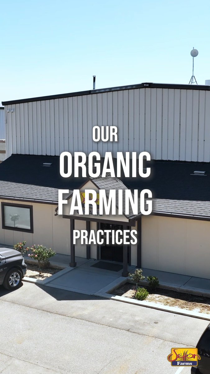 Exterior view of a building with the text 'OUR ORGANIC FARMING PRACTICES' overlaid and a 'SeVen Farms' logo in the bottom right corner.