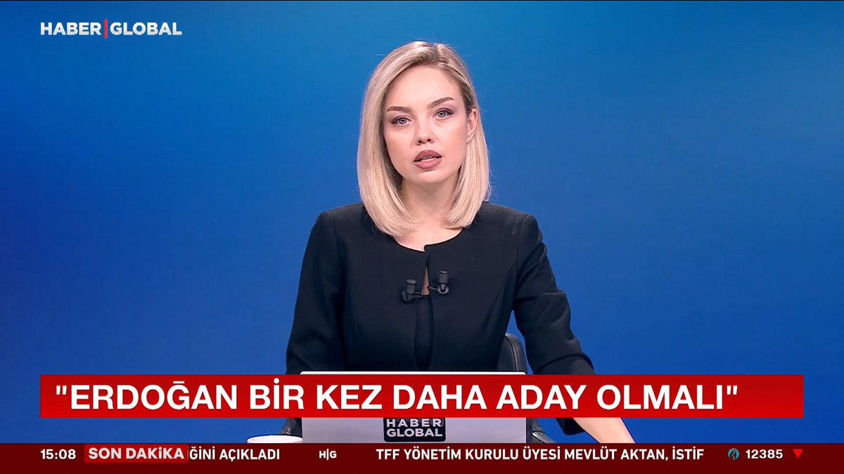A blonde news anchor on Haber Global delivers a broadcast against a blue backdrop, with a red ticker headline reading "ERDOĞAN BİR KEZ DAHA ADAY OLMALI" (Erdoğan should be a candidate once more). The lower news ticker at 15:08 includes a breaking news alert and mentions TFF Executive Board member Mevlüt Aktan's resignation, while the accompanying caption discusses parliamentary decisions on renewed elections being held in 2028.