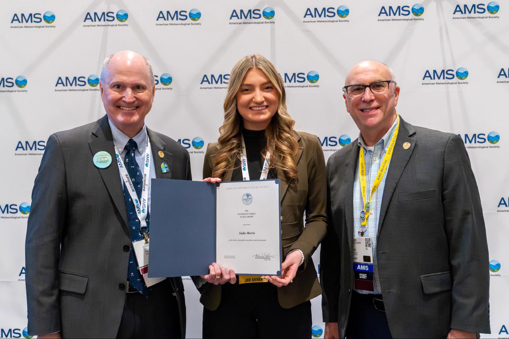 2025 AMS Senior Named Scholarship recipient Sadie Morris with AMS past president Dave Stensrud and Todd Glickman, sponsor of the scholarship.