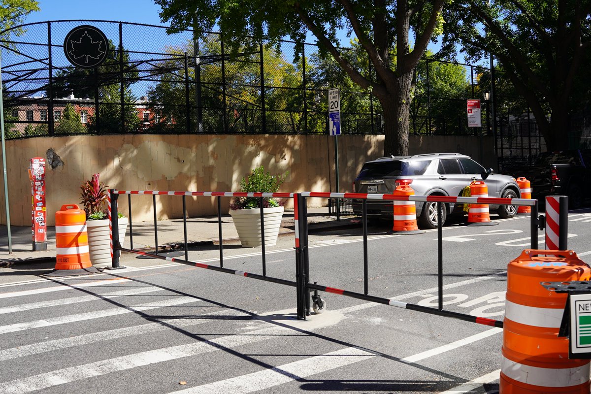 OpenPlans's tweet photo. Happy first day of swing! The new school street gate for City-As school is officially installed on Clarkson St. Modeled after similar designs in Paris, this new infrastructure creates safe, open spaces for students. Let's bring these to schools across NY! https://t.co/ZpAVfGgMmp
