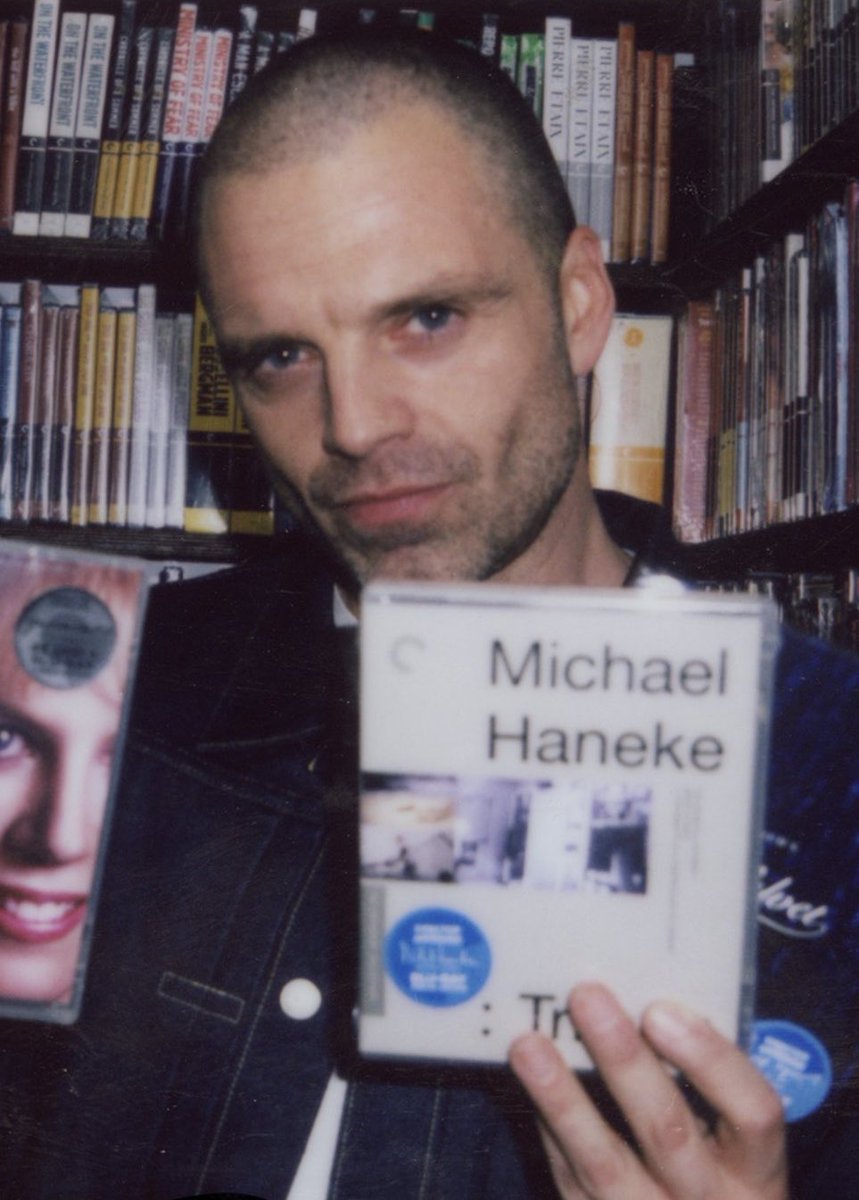 sebstanarchive's tweet photo. Sebastian Stan in the Criterion Closet holding a copy of Michael Haneke: Trilogy, which includes ‘71 Fragments of a Chronology of Chance’, the first film Sebastian was in at 11 years old. https://t.co/uYB3KQrJkp