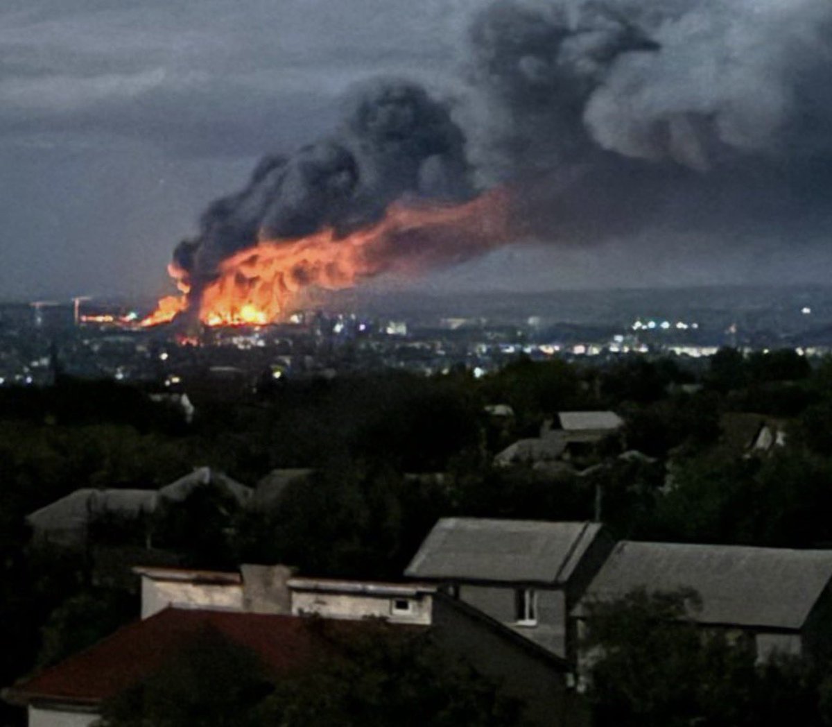 visegrad24's tweet photo. Ukrainian drones struck a Russian logistics center in Luhansk tonight.

It’s completely engulfed in flames https://t.co/6PllgUB0uF