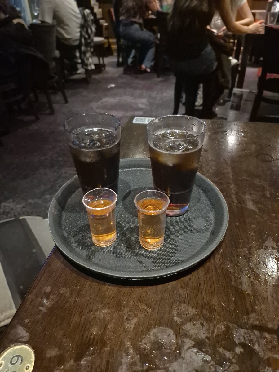 Scarlet_gracexo's tweet photo. Err... someone ordered to the wrong table i think.... i now have (i think and ive had a few) 2 malibu and cokes and 2... no clue shots, smells like candy... https://t.co/FNTXCLcXds
