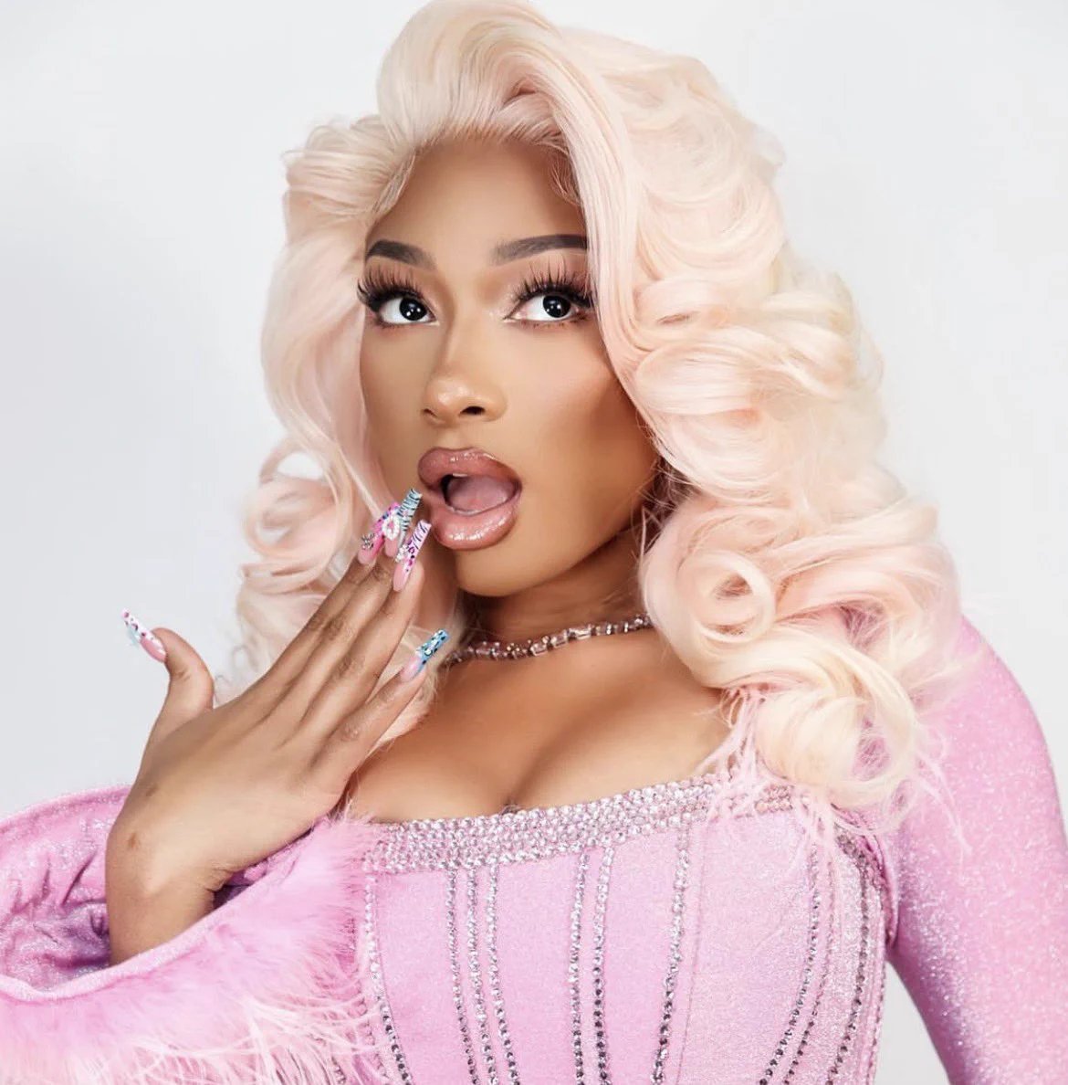 base_celebrity's tweet photo. 🚨Megan Thee Stallion is officially crashing the remix for Dolly Babe’s viral smash “Pink Blush” and it drops tonight. https://t.co/5zf6khkqVw